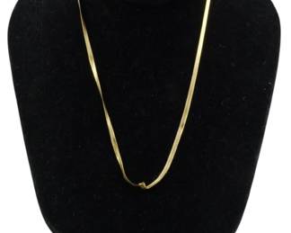 831 - 14kt Italian Gold Herringbone Necklace (Description): 14kt Italian gold herringbone chain necklace  featuring a classic flat, flexible design  with a polished finish. The necklace has a  sleek, elegant profile characteristic of  Italian gold craftsmanship. Weight: 0.15oz.