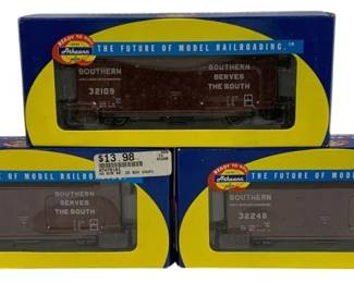 1624 - Athearn Southern 3pc HO Scale Train Cars Set (Description): Athearn "Southern" three-piece set of HO  scale train cars. The set features Southern  Railway boxcars with "Southern Serves the  South" lettering, including car numbers 32109  and 32248. Each car comes in its original blue Athearn "Ready to Roll"ring with "The  Future of Model Railroading" branding.