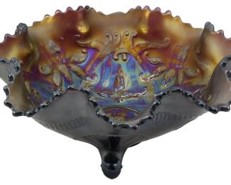 686 - Fenton Amethyst Wishbone Carnival Glass Bowl (Description): Vintage Fenton amethyst Wishbone pattern  carnival glass footed bowl. This striking  piece features the classic Wishbone design  with floral motifs and a ruffled crimped  edge. The iridescent finish displays vibrant blue, purple, and gold tones characteristic  of fine carnival glass. Measures 3 inches  tall by 7 inches in diameter.
