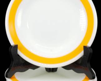 1174 - Set of 4 Pyrex Orange Strip Plates 10.5" (Description): Set of four Pyrex plates featuring a bold  orange band design around the rim. The plates  have a clean white center with the  distinctive orange stripe bordered by narrow  white edges. These classic milk glass dinnerware plates measure 10.5 inches in  diameter.