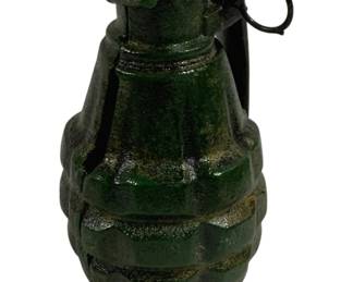 1516 - Cast Iron Grenade Bank 6"x3" (Description): Cast iron grenade bank featuring a  pineapple-style design with segmented body.  The bank is finished in green paint with  natural patina and wear. Features a pull-ring  detail at the top. Measures 6 inches by 3 inches.