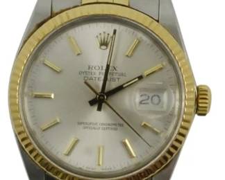 838 - Rolex Datejust Two Tone Steel Watch (Description): Rolex Oyster Perpetual Datejust two tone  watch featuring stainless steel and yellow  gold construction. The timepiece showcases a  silver dial with gold baton hour markers,  date window at 3 o'clock with cyclops magnifier, and a fluted gold bezel. Fitted  with the classic Jubilee bracelet in matching  two tone stainless steel. Used as is  electric/electronic/mechanical item. No  guarantee all components, untested.