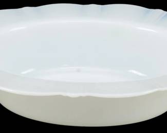 924 - Monax American Sweetheart Serving Bowl (Description): Monax American Sweetheart serving bowl in  translucent white opalescent glass. This  Depression-era piece features the pattern's  characteristic scalloped edge with elegant  fluted rim detail. The bowl has a smooth interior and gently curved sides. Measures 2  1/2 inches high by 11 inches long by 8 inches  wide.