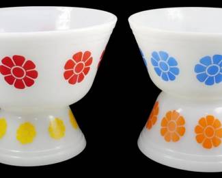 1102 - Set of 4 Federal Glass Daisy Bowls 4"x3" (Description): Set of four Federal Glass Daisy pattern bowls  in white milk glass featuring colorful  floral designs. The collection includes bowls  with red, blue, yellow, and orange daisy  motifs characteristic of mid-century American glassware. Each bowl measures 4inches in  diameter by 3 inches tall.