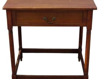579 - Vintage 1 Drawer Stand 32"x30"x25" (Description): A wooden table featuring a single drawer with  a brass bail pull handle. The table has  turned legs connected by stretchers. Measures  32 inches by 30 inches by 25 inches. Worn Spot on Table Top.
