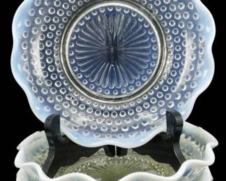 920 - 4 Anchor Hocking Moonstone Opalescent Bowls (Description): Set of four vintage Anchor Hocking Moonstone  pattern bowls featuring the distinctive  hobnail design with opalescent white ruffled  edges. The translucent glass displays a  beautiful blue opalescent quality characteristic of the Moonstone line. Each  bowl measures 1.5 inches tall by 7.5 inches  in diameter.