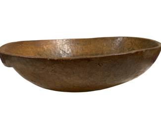 1449 - Antique Burl Hand Carved Dough Bowl (Description): The bowl features carved side handles with a  number printed on the side at the handle -  1.28353.  We suspect there is wood filler in  the bottom of the bowl as there are cracks. measures 24.75 x 21.75 x 16.5