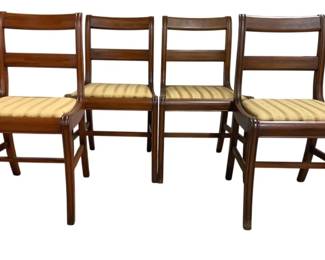 7670 - Set of 4 Mahogany Dining Chairs (Description): Featuring classic double horizontal slat  backs with gently curved top rails. Each  chair has an upholstered seat in a striped  gold and cream fabric. The chairs rest on  saber-style front legs connected by stretchers for stability. Measures 33 inches  high by 16 inches wide by 19 inches deep.