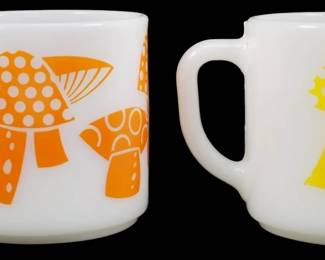 1119 - Pr Vtg Federal Mushroom Mugs Orange & Yellow (Description): Pair of vintage Federal milk glass mugs  featuring a whimsical mushroom design. One  mug displays the pattern in orange, the other  in yellow. Both feature polka-dotted  mushroom caps with decorative stems in the classic 1970s style. Each mug measures 3"  tall.
