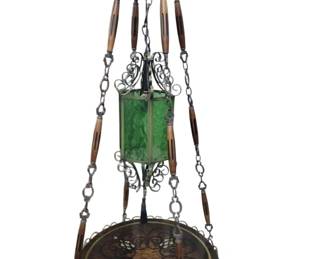 1 - RARE Mid-Century Spanish Swag Lamp Table (Description): Very hard to find Spanish Revival hanging swag lamp with green glass central hexagonal lantern and supporting hanging decorative marble circular table, all adorned with iron scrollwork. Height 60" or more with chain, 24" diameter table. Used as is electric/electronic/mechanical item. No guarantee all components present, untested.