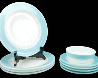 1194 - 9pc Pyrex Turquoise Band 8 Plates & Bowl (Description): A nine-piece set of Pyrex dinnerware  featuring the classic Turquoise Band pattern.  The collection includes eight plates in  varying sizes and one bowl. Each piece  displays the distinctive turquoise blue rim against a white milk glass center,  characteristic of mid-century Pyrex design.