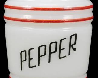 1229 - Vtg Anchor Hocking Pepper Shaker 5" (Description): Vintage Anchor Hocking pepper shaker in white  milk glass with red horizontal stripe  detailing. Features black lettering spelling  "PEPPER" on the front and a black metal  screw-on lid. Measures 5 inches tall.