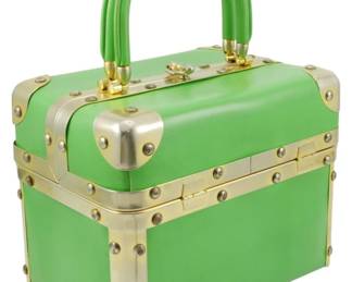 1247 - Vintage Delil Cubic Green Box Purse (Description): Vintage Delil cubic green box purse with  structured rectangular form. Features  gold-tone and silver-tone metal hardware with  decorative corner brackets and studded  accents throughout. Equipped with a matching green double handle and heart-shaped front  clasp closure. Marked with pen on top.  Measures 11 inches by 5.5 inches by 8 inches.  As is, has writing transferred onto the top