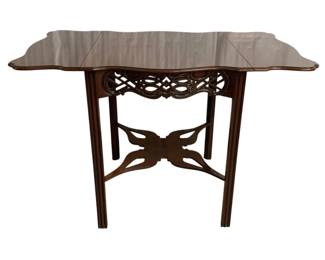 7554 - Baker Chippendale Drop Side Table (Description): Historic Charleston Reproductions.  Very  clean mahogany, intricate carved fretwork. 28  x 43 x 26