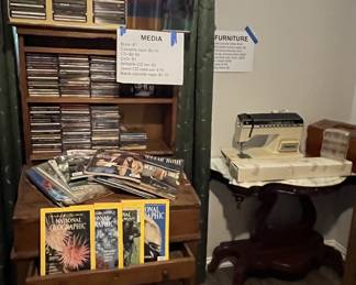 Antique desk, marble console table, CDs, magazines, sewing machine