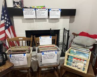Flags and flagpoles, records, fireplace set, chairs, seat cushions
