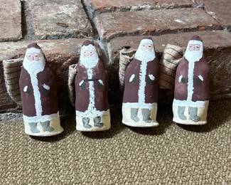 148 fourprimitiveclothsantafigurines