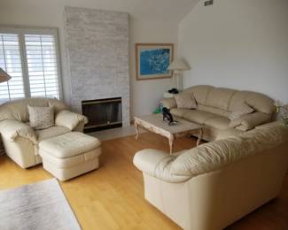 Leather living room furnishinsg: couch; loveseat; oversixe chair; ottoman