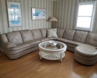 Large gray sectional sofa is also a sleeper sofa! Coastal chic glass top coffee table