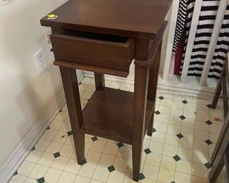 Foyer, decorative stand with drawer.