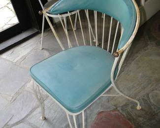Two of these MCM chairs