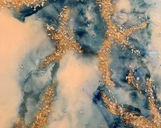 This piece of art is absolutely amazing. It’s acrylic covered. I believe that’s what it’s called with the turquoise sky, blue ivory and gold.
