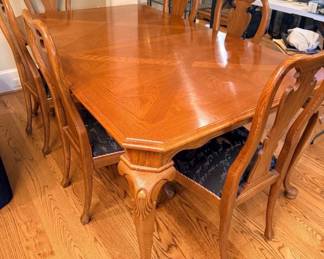 Dining chairs are easy to recover however, they are in a Fabulous black patterned rooster print