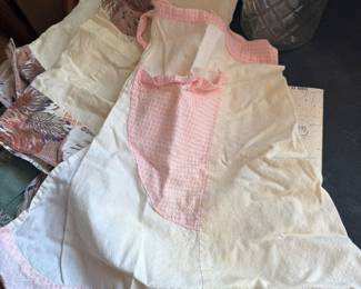 These are adorable vintage little girl aprons