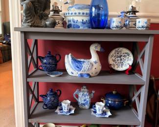 Blue and white porcelain collection with Asian Quan Yin statue