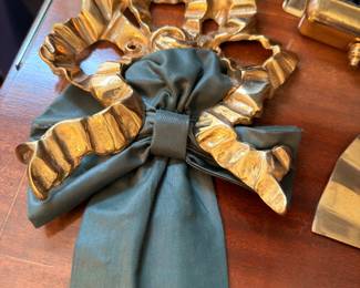 Gilt bow wall ornament with fabric drape