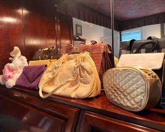Quilted gold bag and assorted purses