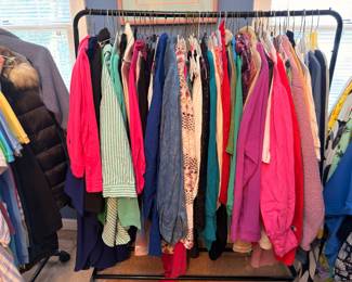 Rack of colorful women's tops and coats
