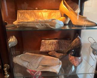 Vintage snakeskin clutches and gold evening shoes