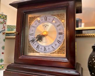 Mahogany case mantel clock with Roman numerals