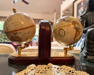 Double globe bookends on wood base