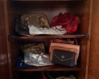 Cabinet full of purses and evening bags