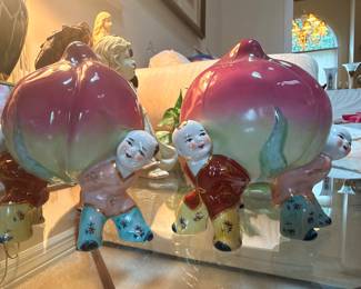 Pair Chinese porcelain peach boy figurines