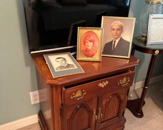 Samsung flat screen TV and cherry cabinet
