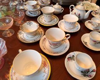 Assorted porcelain teacups and saucers