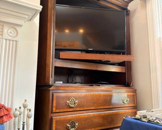Cherry entertainment armoire chest and flat screen TV