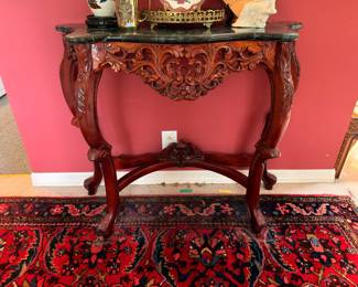 Carved mahogany marble top console table