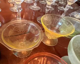 Yellow depression glass sherbets and champagne stems