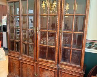 Mahogany breakfront china cabinet with glass doors