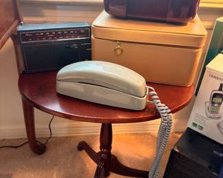 Pedestal side table with phone and radios