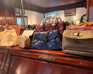 Collection of leather and woven handbags