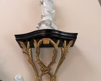 Blanc de chine Quan Yin on gilt wall shelf
