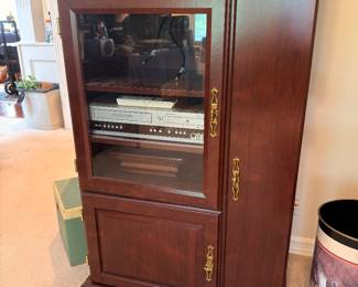Cherry media cabinet with stereo receiver