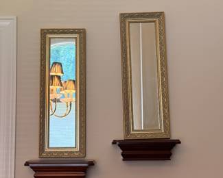 Wall mirrors and wood display shelves