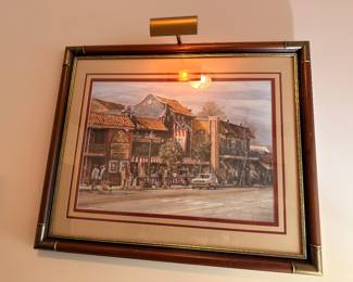 Framed street scene print with picture light