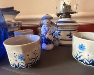 Blue and white planters, figurine and oil lamp